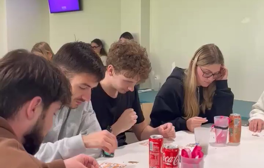 Students playing charity bingo in the student lounge