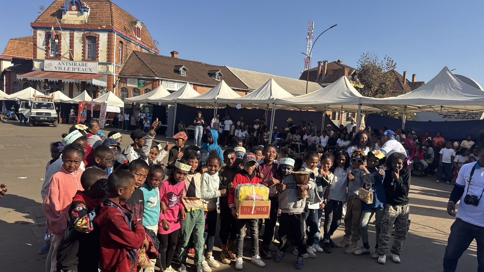 The water festival on the station square in Antsirabe, with the children from the centre