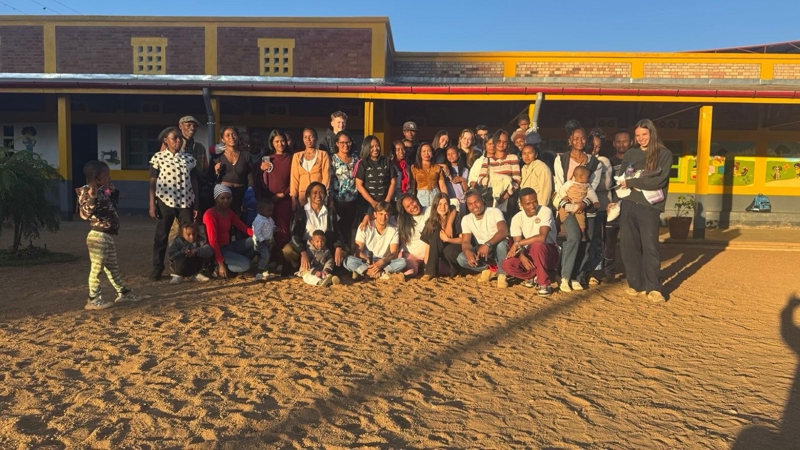 Volunteers, staff and families at the Fanantenana centre