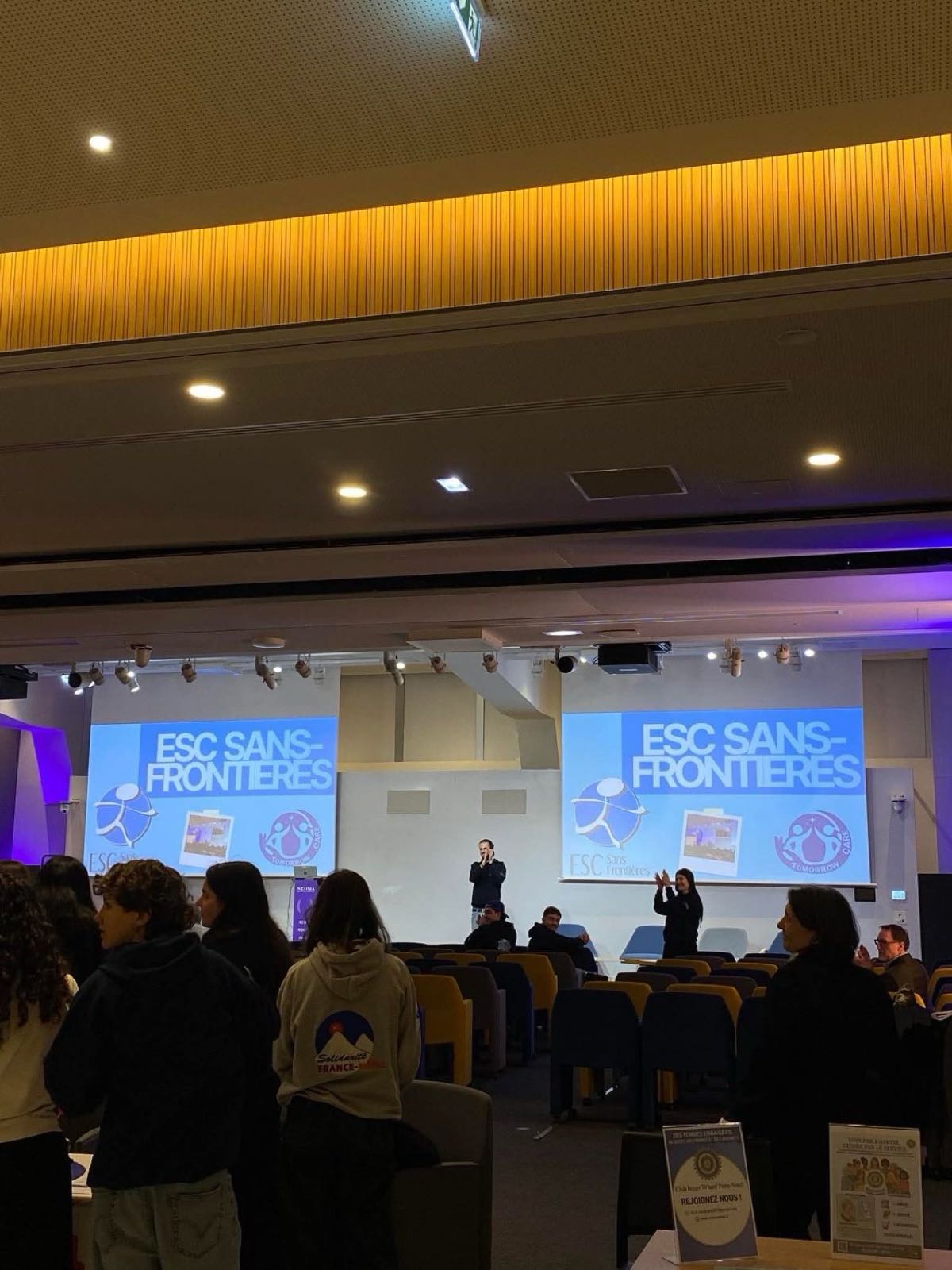 The Tomorrow Care lecture hall, with the ESC Sans Frontières logo on both screens
